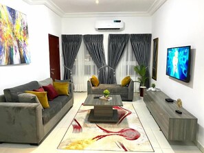 Junior Room, Balcony, City View | Living area - Lilly Grand Luxury Hotel and Apartment (Abuja)