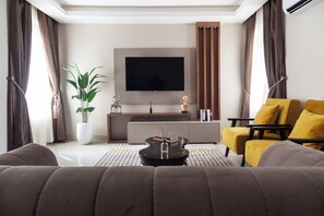 Standard Room, Balcony, City View | Living area - Phoenix Imperial Hotel and Apartment (Abuja)