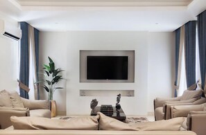 スタンダード ルーム バルコニー シティビュー | リビング エリア