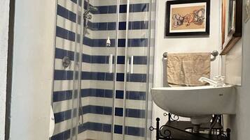 Hair dryer, towels, soap, toilet paper