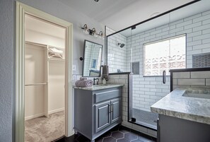 Shower, towels, soap, toilet paper