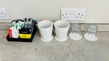 Shower, towels, soap, toilet paper