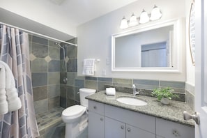 Shower, hair dryer, towels