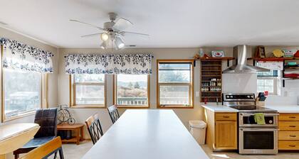 Cozy family-friendly home with game room, valley views, private hot tub, grill