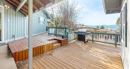 Cozy family-friendly home with game room, valley views, private hot tub, grill