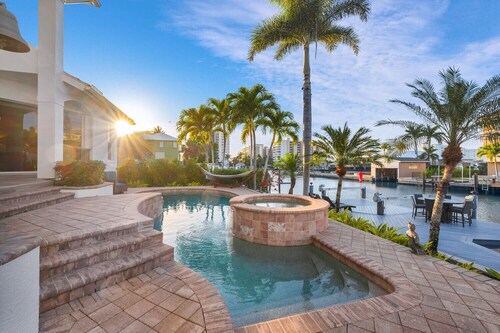 Tropical Oasis! - Luxury Canal Home! 1 Mile To The Beach! Heated Pool & Spa