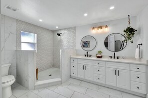 Shower, hair dryer, towels