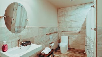 Shower, hair dryer, towels, soap