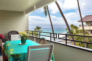 Outdoor dining - White Sands Village 214 – Modern Condo for 4 w/ Enviable Ocean Views! (Kailua Kona)