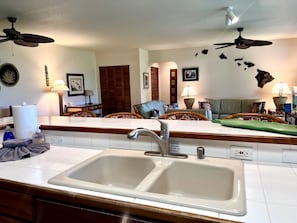 Enjoy cooking in this kitchen with a double sink and ample countertop space.