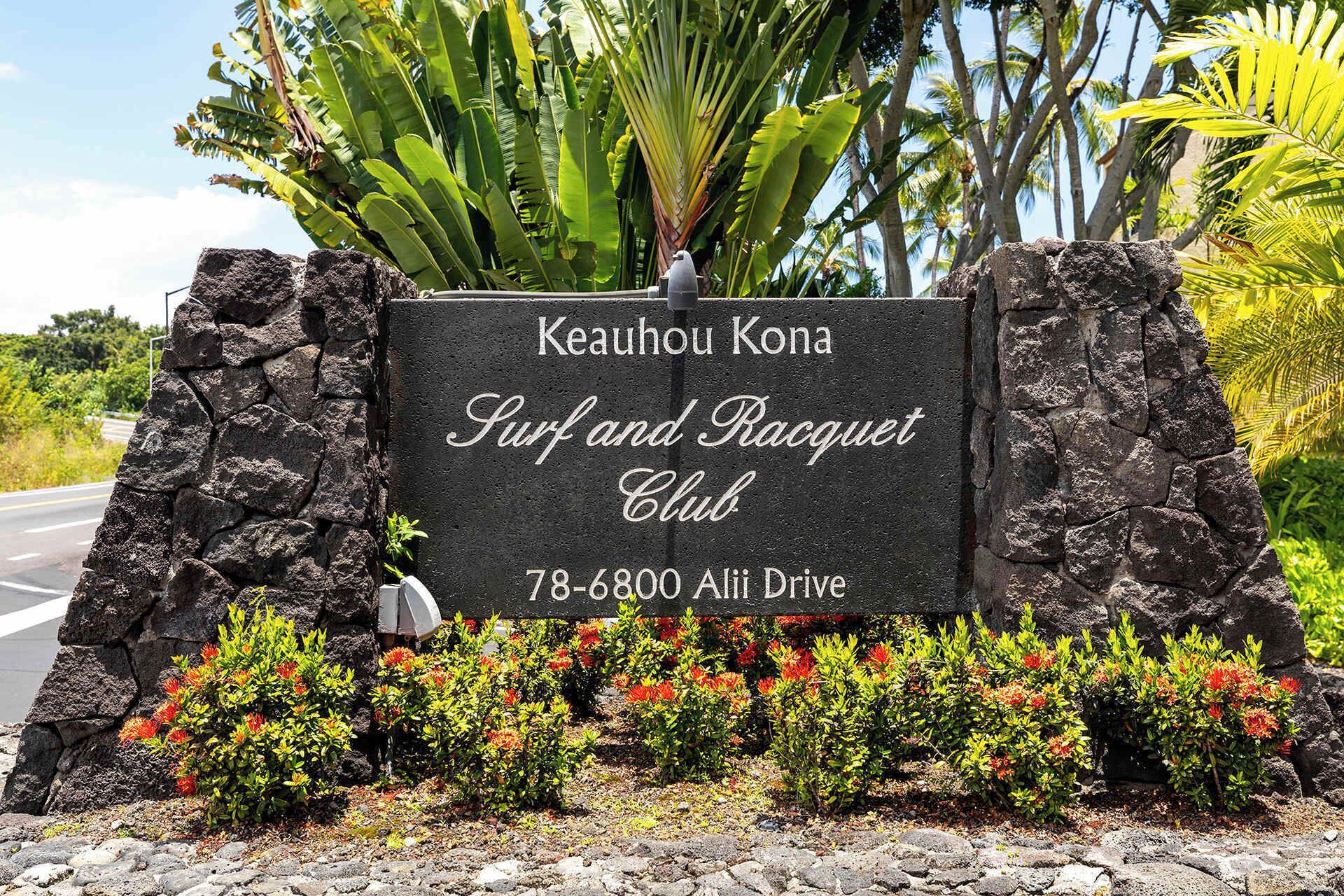 A sign for Keauhou Kona Surf and Racquet Club at 78-6800 Alii Drive.
