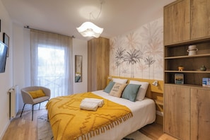 2 habitaciones, tabla de planchar con plancha, cuna de viaje y wifi 