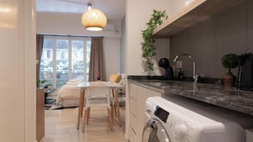 Comfort Studio Suite, City View | 1 bedroom, desk, laptop workspace, iron/ironing board