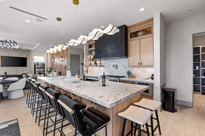 Fridge, microwave, oven, stovetop - Modern Beachfront Retreat in Crystal Beach – Pool, Elevator & Sleeps 20 (Bolivar Peninsula)