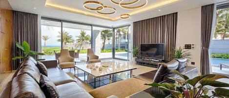 Villa, Multiple Beds, Pool Access, Pool View (OV K5a) | Living area | 42-inch flat-screen TV with digital channels