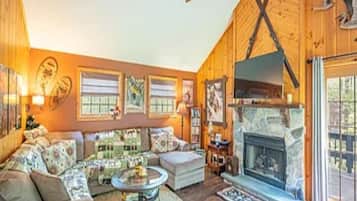 Smart TV, DVD player, foosball, books