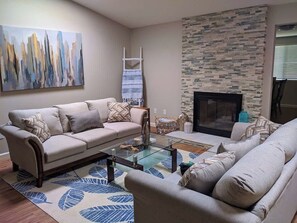 TV, fireplace, books, offices