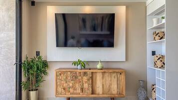 Suite Confort, vista al mar | Área de sala de estar