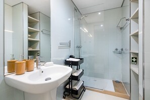Shower, hair dryer, towels, soap