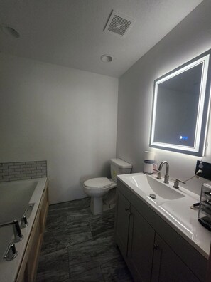 Hair dryer, towels, soap, toilet paper