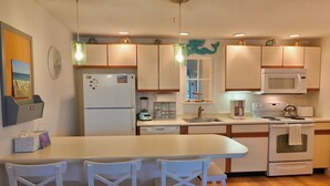 Coffee/tea maker, fridge, microwave, oven - Located just steps from Wells Beach, Eastwinds 123 is perfect for your getaway. (Wells)