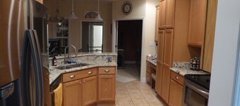 5-bed home in Myrtle Beach has AC, WiFi, pool table, garage, HOA large amenities