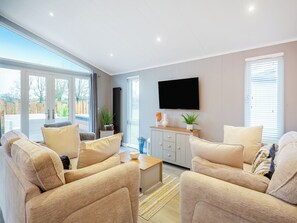 Living area - Relax in comfort and make Sandbanks your home whilst exploring Anglesey. (Benllech)