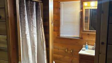 Shower, towels, soap, toilet paper