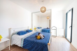 1 habitación, tabla de planchar con plancha, wifi gratis y ropa de cama 