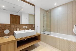 Grand Apartment, 1 King Bed | Bathroom | Rainfall showerhead, free toiletries, hair dryer, bathrobes