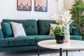 Classic Apartment, 1 King Bed | Living area | 50-inch Smart TV with digital channels