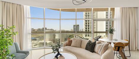 Premier Apartment, 1 King Bed | Living area | 50-inch Smart TV with digital channels