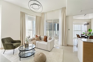 Elite Apartment | Living area | 50-inch Smart TV with digital channels