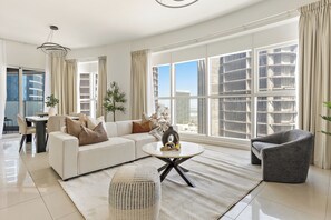 Grand Apartment | Living area | 50-inch Smart TV with digital channels