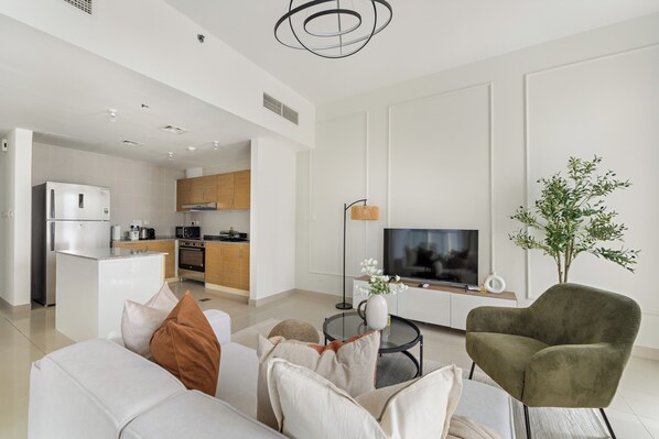 Elite Apartment | Living area | 50-inch Smart TV with digital channels