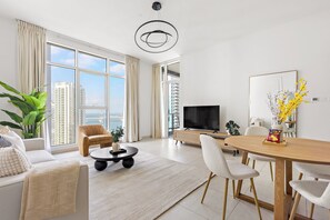 Elite Apartment, Multiple Beds | Living area | Smart TV