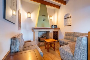 TV, fireplace - Villa 'Can Vila' with Private Pool, Wi-Fi, and Air Conditioning (Illes Balears)