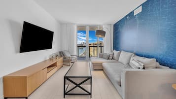 Deluxe Apartment, Air conditioning, Partial Ocean View | In-room safe, blackout drapes, iron/ironing board, free WiFi