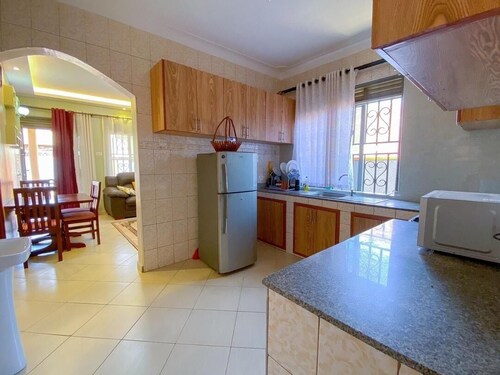 A family-friendly 2/3 bedroom, 2 bathrooms bungalow in Kampala Uganda