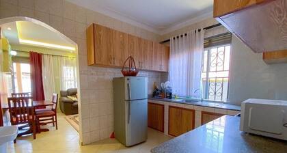 A family-friendly 2/3 bedroom, 2 bathrooms bungalow in Kampala Uganda