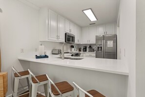 Fridge, microwave, oven, stovetop - Dog Friendly, Steps away from the beach, Restaurants, Village, and Pier. (Saint Simons Island)
