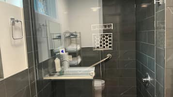Shower, eco-friendly toiletries, hair dryer, towels