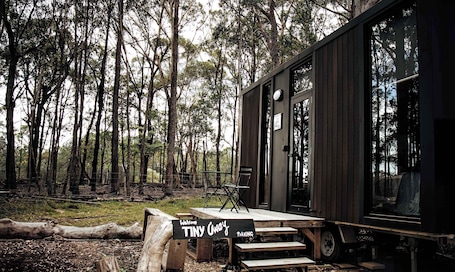 Terrace/patio. Solitary Islands Farm 1 by Tiny Away