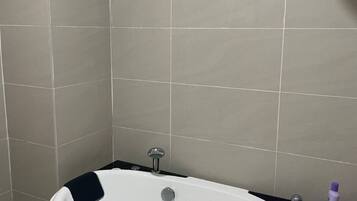 Hair dryer, bidet, towels, soap