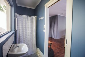 Shower, eco-friendly toiletries, hair dryer, towels