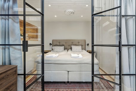 Apartamento de lujo | Ropa de cama de alta calidad y colchones con acolchado adicional