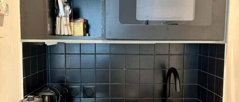 Fridge, microwave, coffee/tea maker, toaster