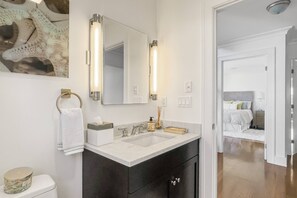 Shower, hair dryer, towels, shampoo