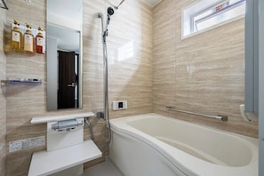 Hair dryer, bidet, towels, soap