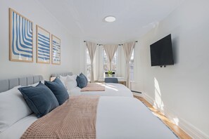 3 bedrooms, desk, iron/ironing board, travel cot